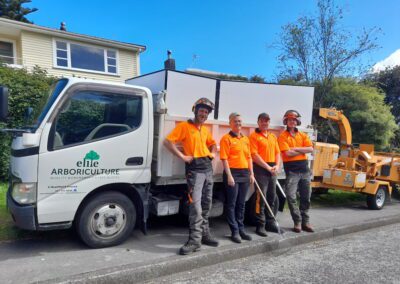 A picture of Elite Arboriculture expert team with their equipment's behind them